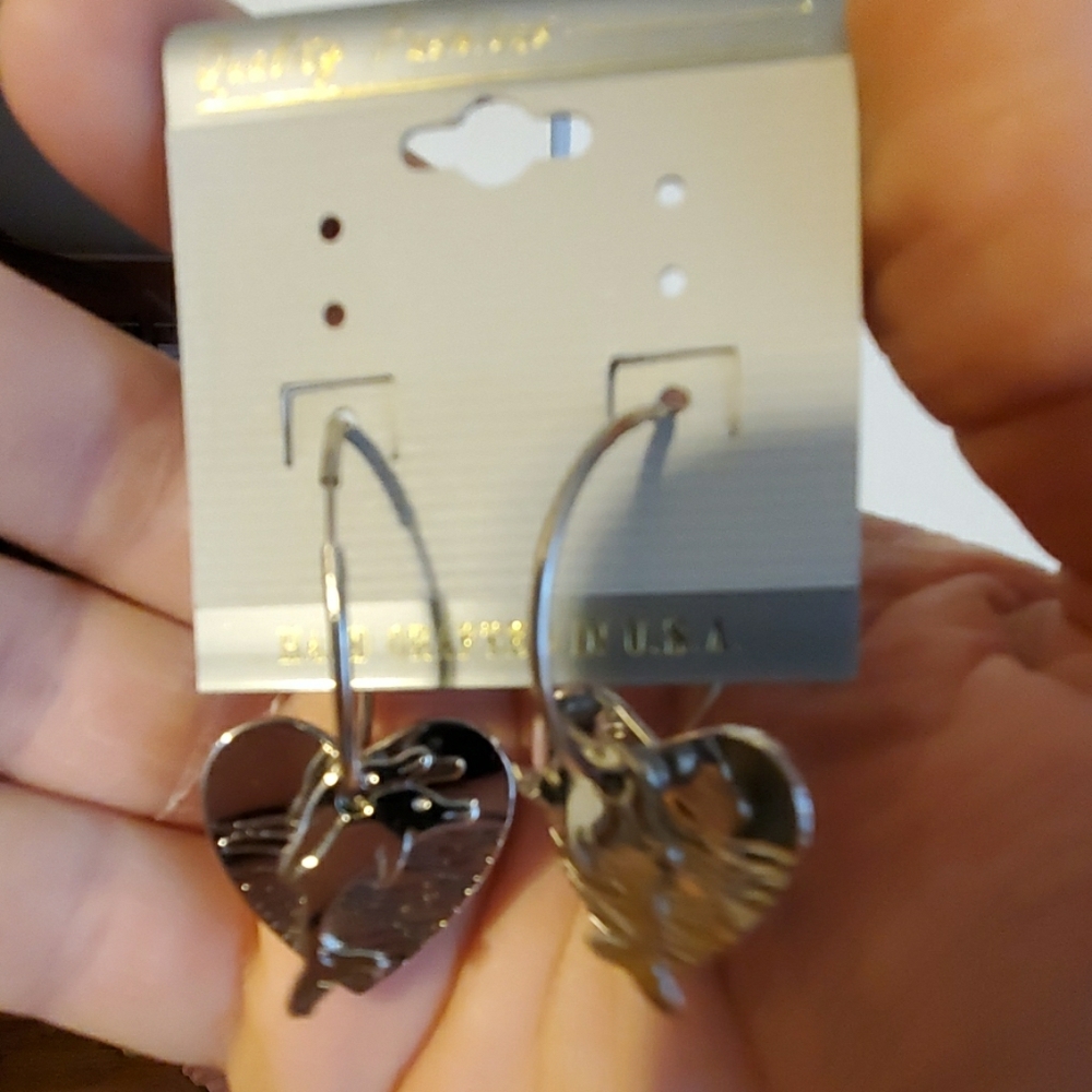 Handcrafted stainless steel dolphins earrings